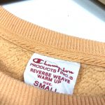 vintage clothing champion embroidered repeat logo peach sweatshirt