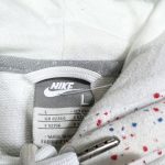 vintage nike paint splatter patterned white hoodie with printed logo