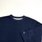 a plain navy vintage champion sweatshirt with embroidered c logo