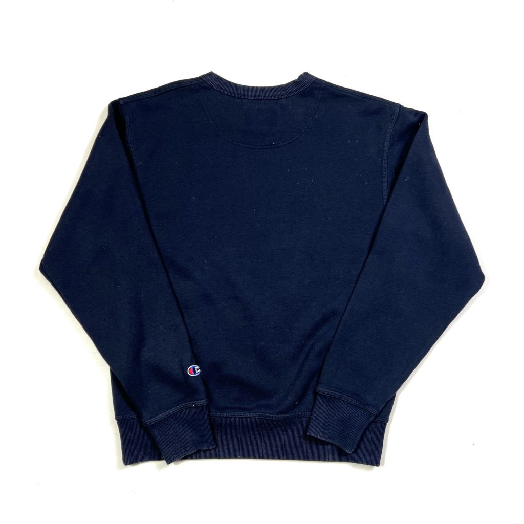 a plain navy vintage champion sweatshirt with embroidered c logo