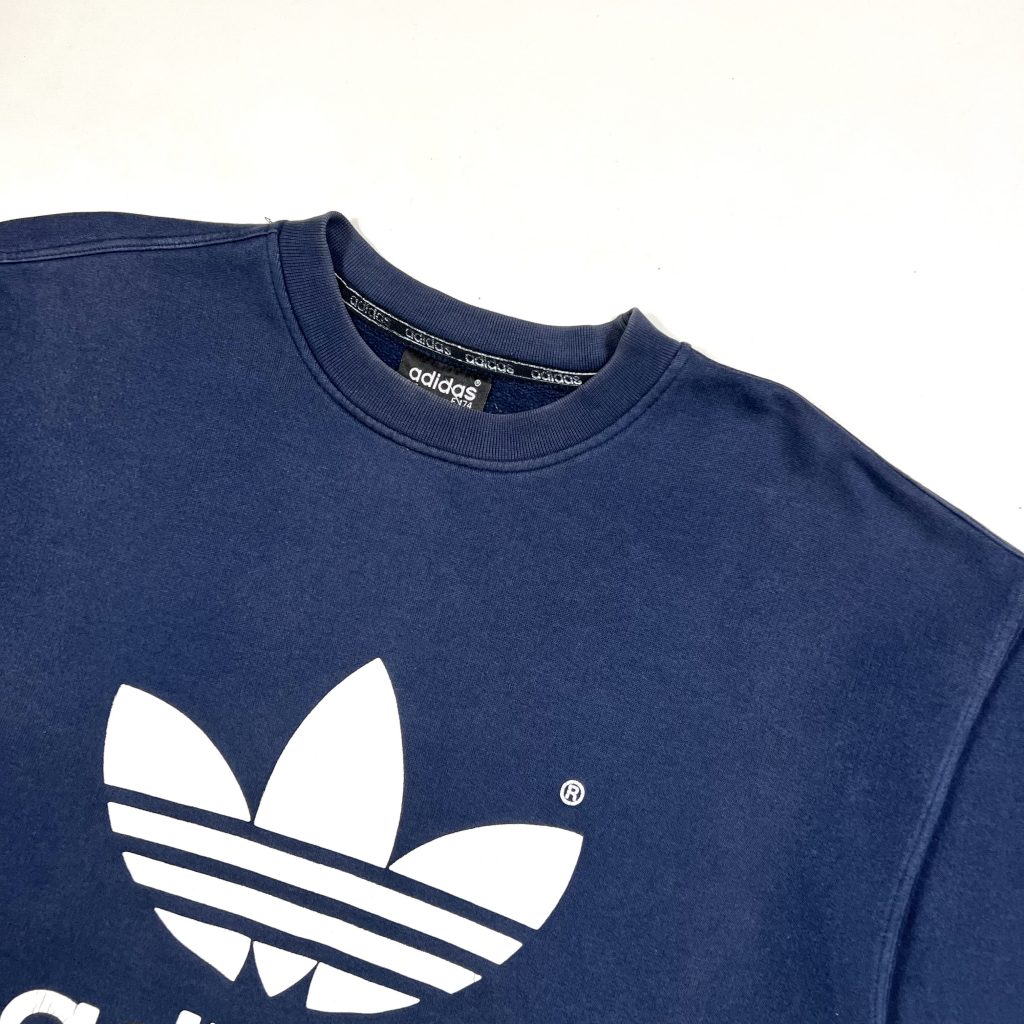 a vintage adidas originals navy sweatshirt with big printed trefoil logo