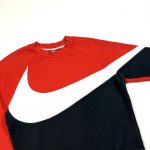 a nike red and black vintage sweatshirt with big swoosh logo