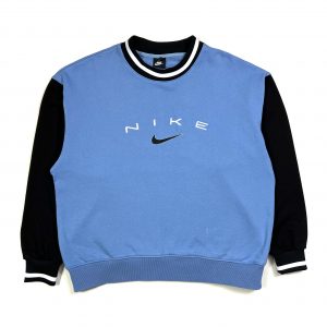 a nike blue centre swoosh logo vintage sweatshirt with banded collar and cuffs