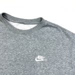 a vintage grey nike embroidered logo sweatshirt