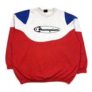 a reworked vintage champion branded red sweatshirt with embroidered script logo.