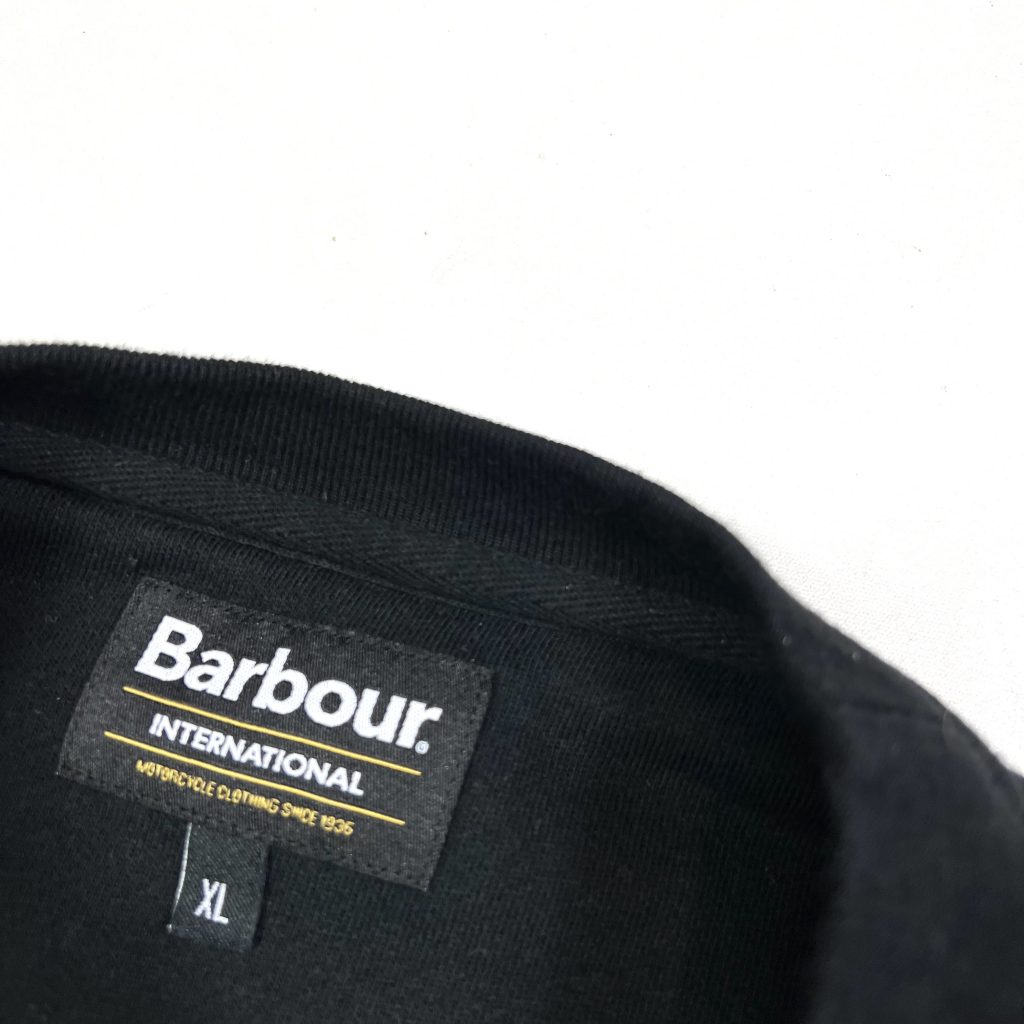 barbour black sweatshirt with printed white graphic on the front.