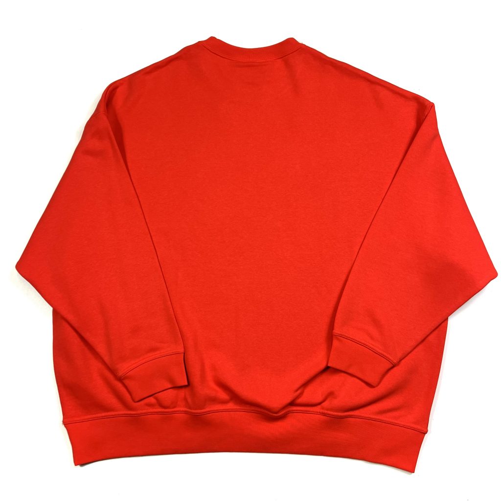 a vintage nike oversized red centre swoosh logo sweatshirt