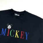 mickey mouse embroidered on a black vintage disney jumper
