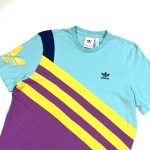 a blue adidas trefoil vintage t-shirt with yellow 3 stripes