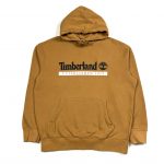 a mens timerland mustard coloured hoodie with printed logo