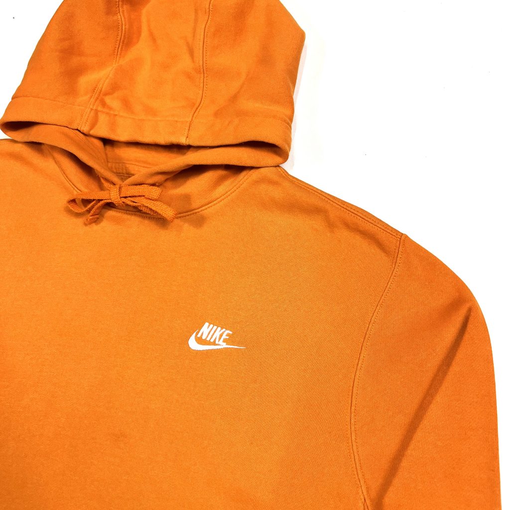 Orange Nike Club hoodie with embroidered logo