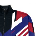 a vintage 90’s adidas black track jacket with red, white blue 3-stripes detailing