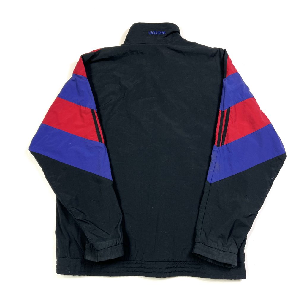 a vintage 90’s adidas black zip-up track jacket