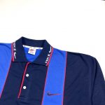 a vintage bootleg nike blue striped polo sweatshirt