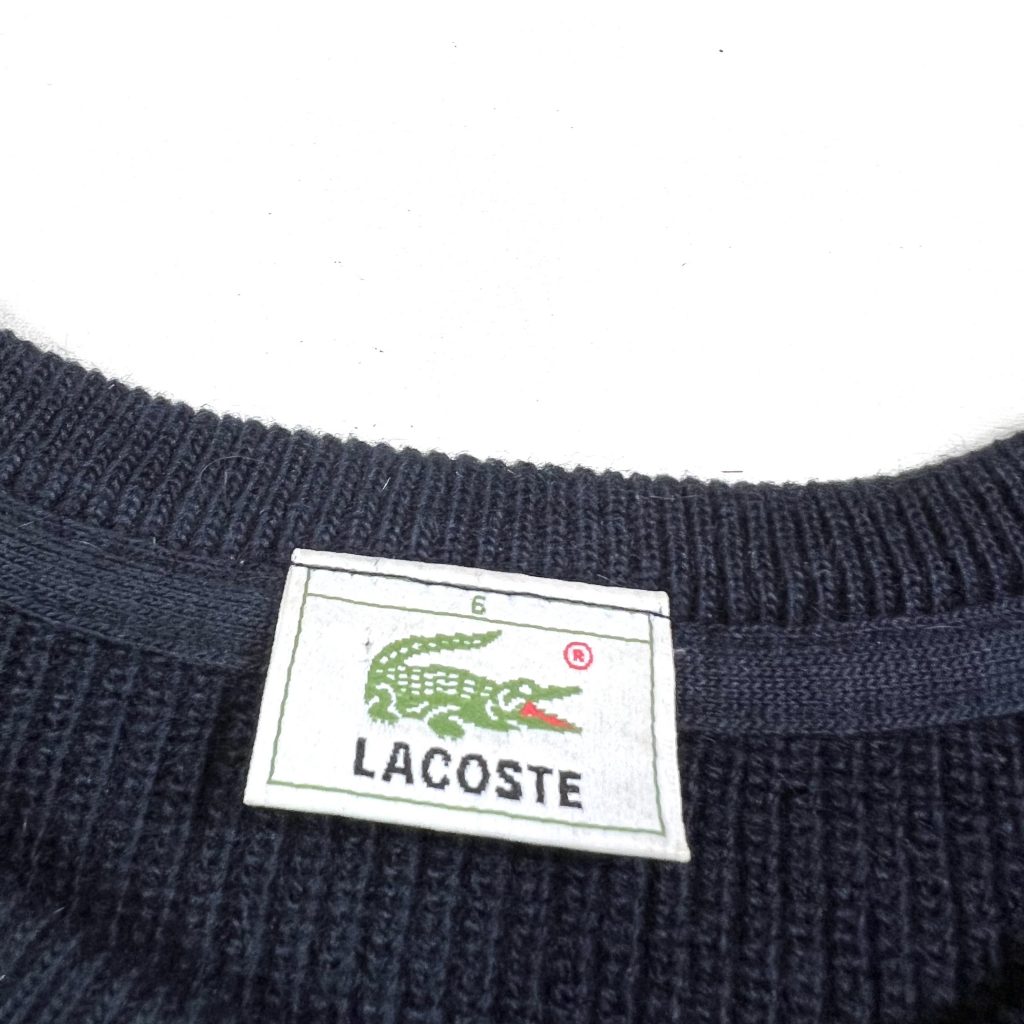 A vintage navy Lacoste knit jumper, size xl