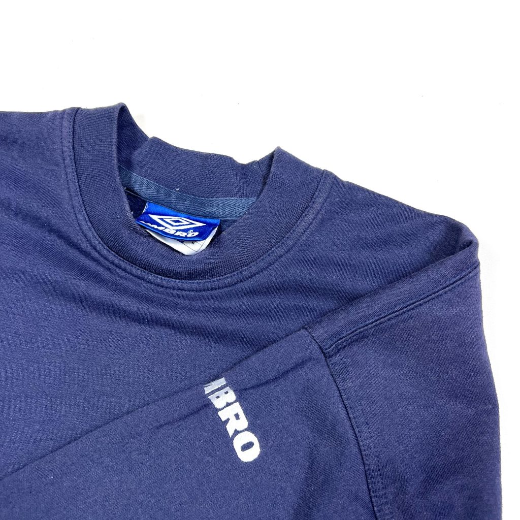 Vintage Umbro navy sweatshirt with embodied essential logo