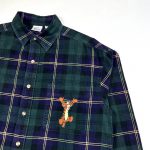 embroidered disney tigger character on a corduroy shirt pocket