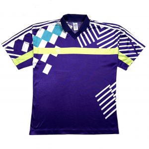 a vintage 90s adidas geo patterned purple football shirt