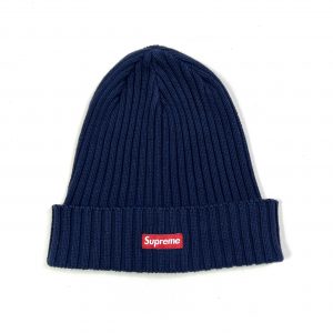 navy supreme knitted beanie hat with red logo